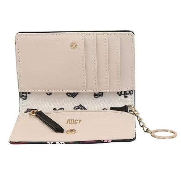 Open tan and black Juicy Couture wallet with keychain.