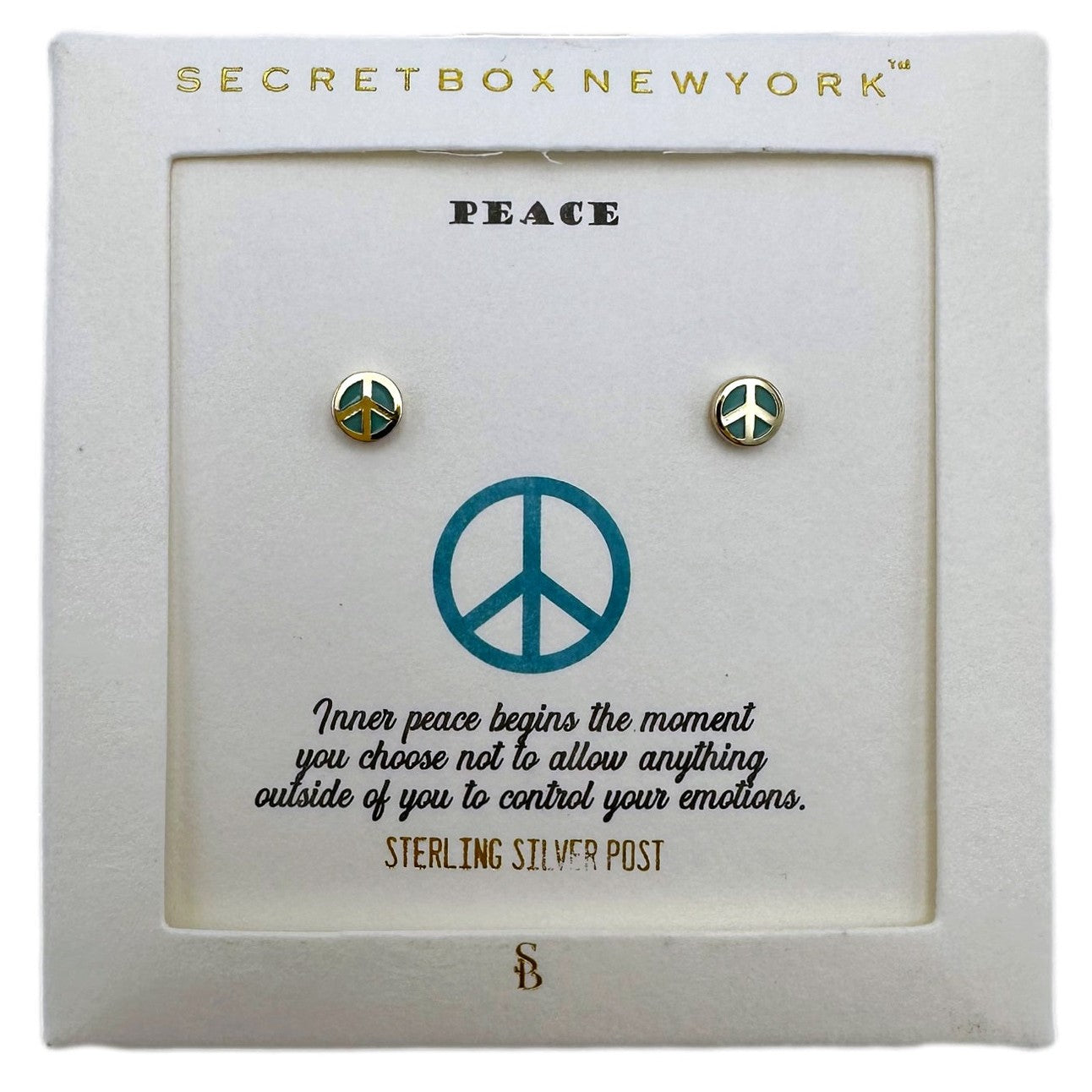 Peace sign earrings on a display card.