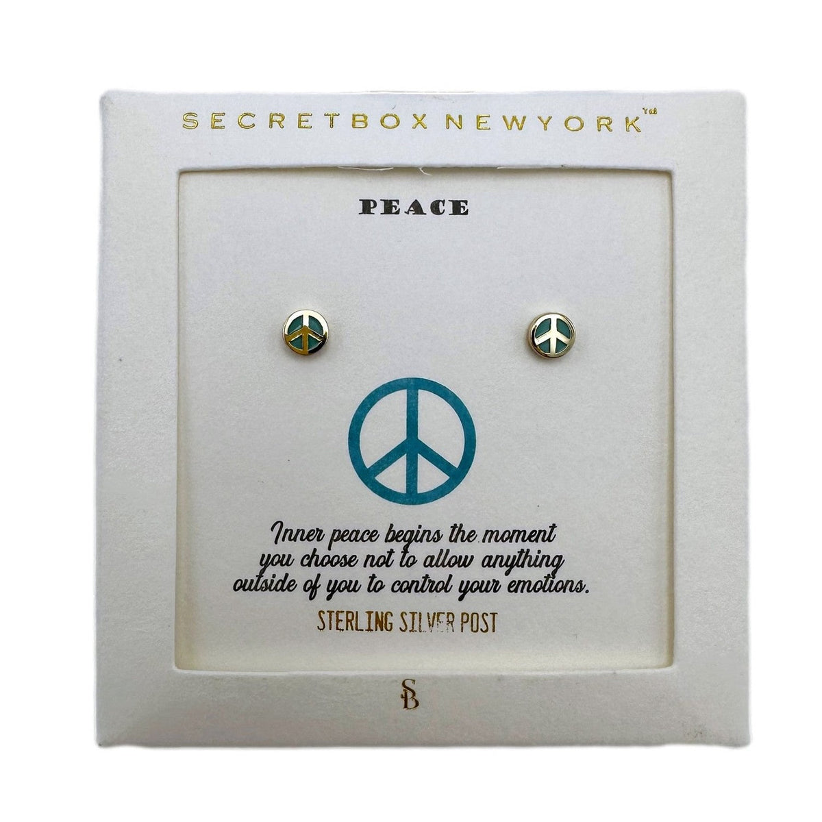 Peace sign earrings on a display card.