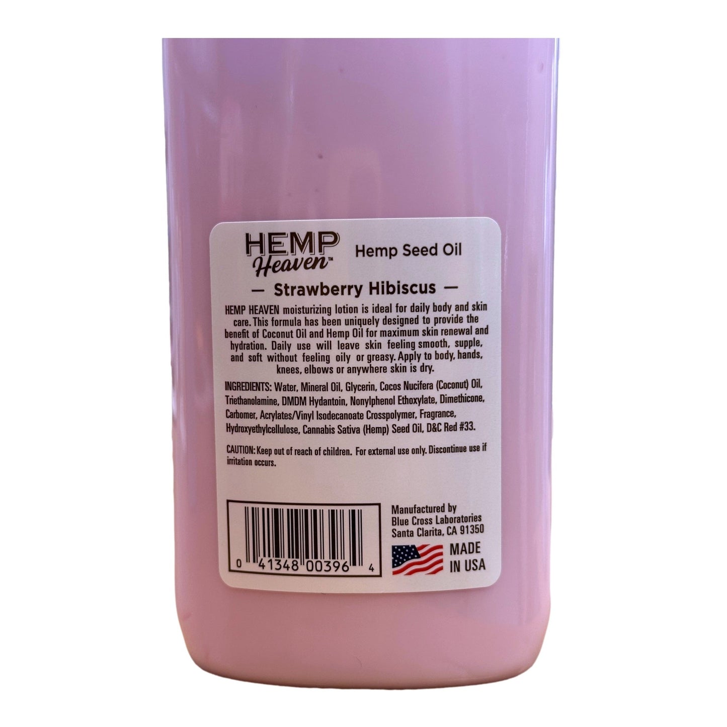 A bottle of pink Hemp Heaven lotion with a label containing product information and a barcode.