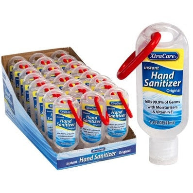 A display box filled with small XtraCare hand sanitizer bottles, with one bottle standing outside the box.