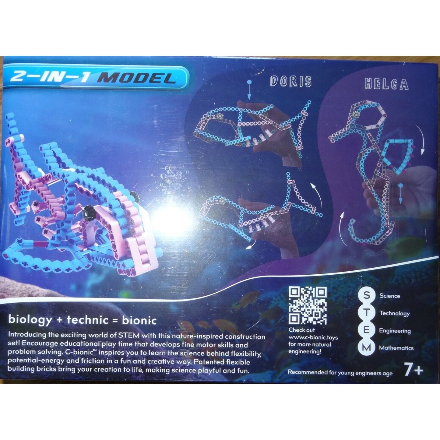 The box of a toy set with two models made of flexible bricks.