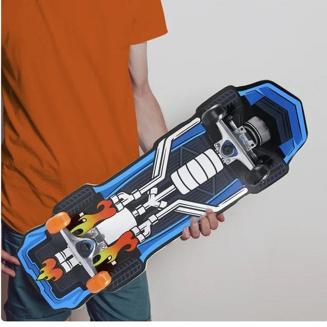 A person holding a skateboard with a blue, black, and white car chassis design. The person is wearing an orange shirt and blue shorts.