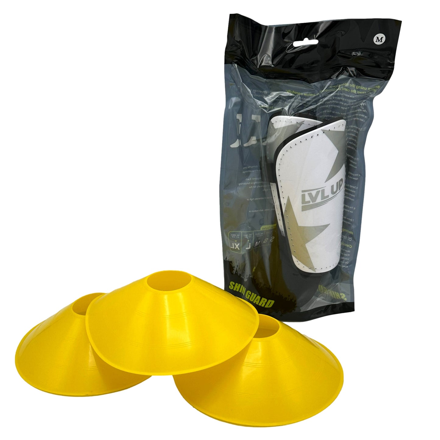Yellow cones and shin guards in plastic packaging.