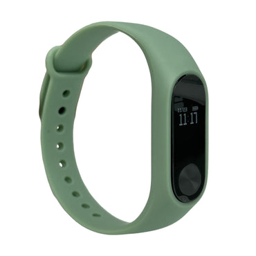 Green smart band with digital display reading 11:17.