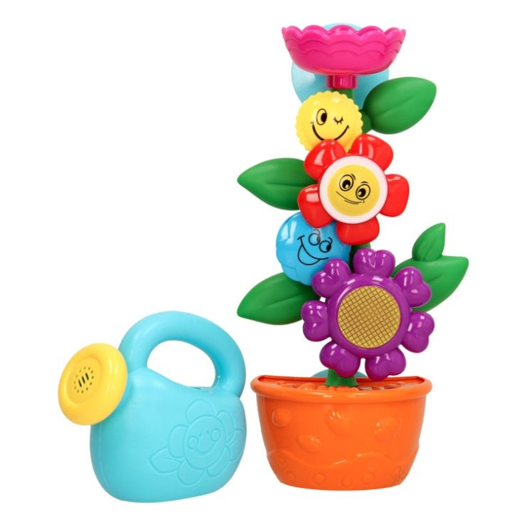 A toy plant in a pot with a toy watering can.