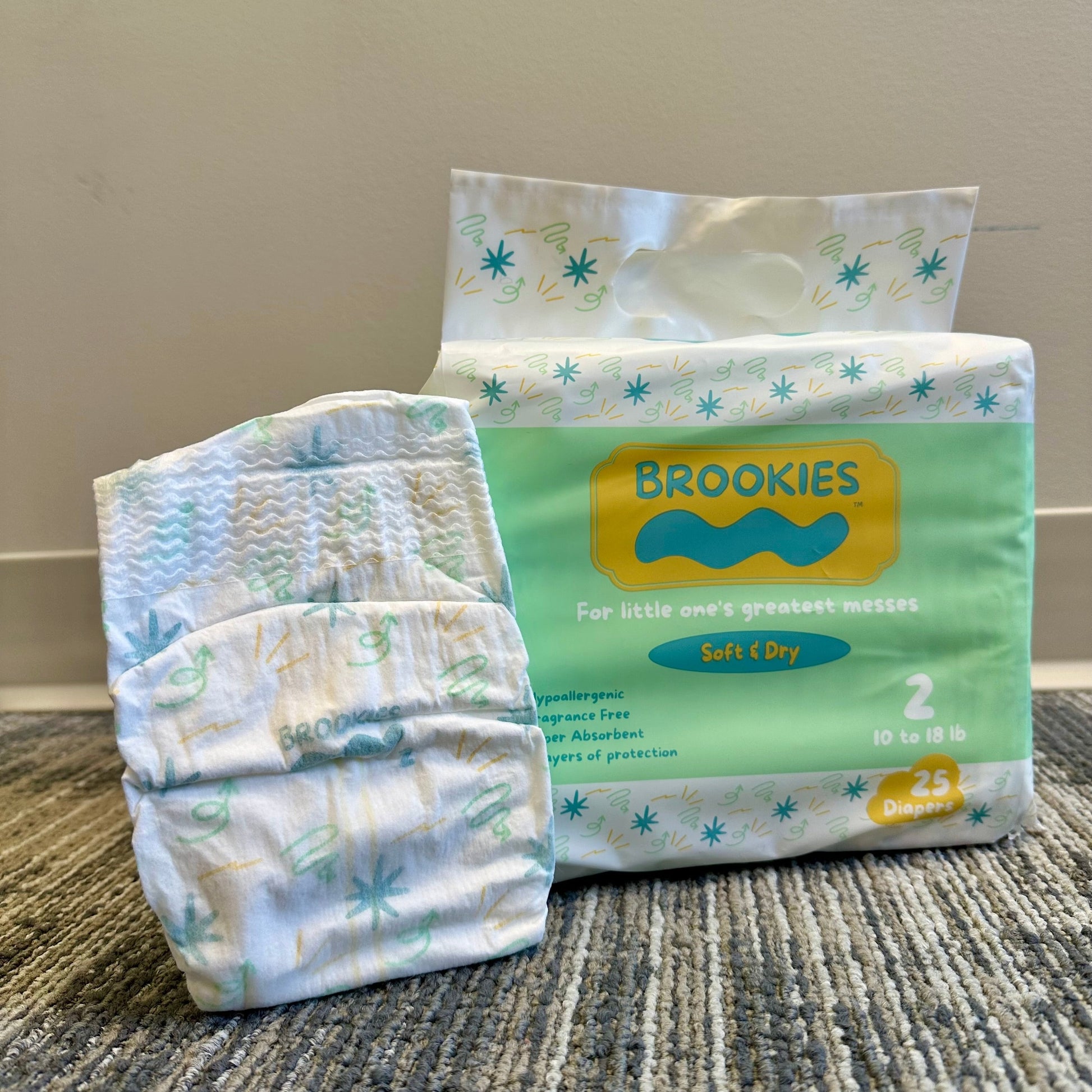 A package of Brookies brand size 2 diapers with a diaper beside it.