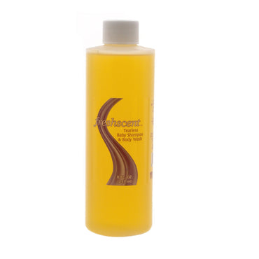 A yellow bottle of freshscent Tearless Baby Shampoo & Body Wash.