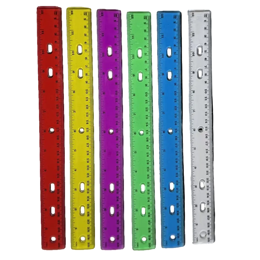 Set of colorful rulers with measurement markings on a white background