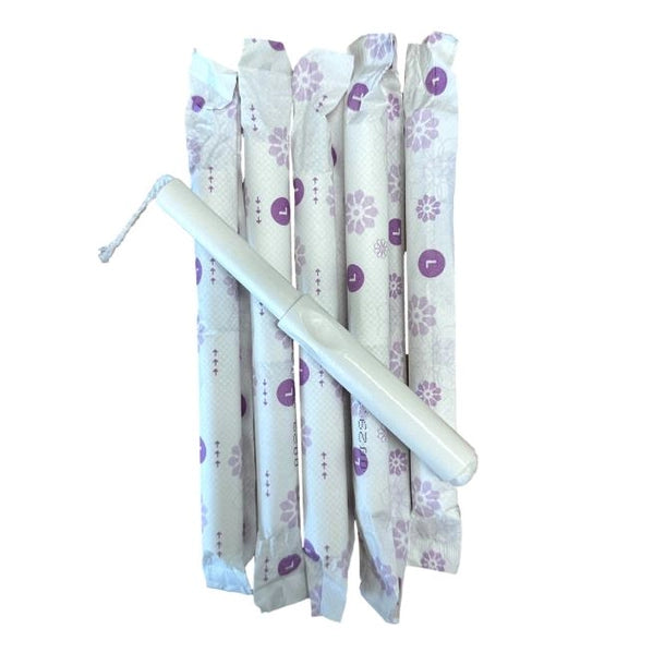 Packaged tampons with applicator.