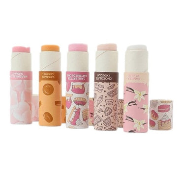 Five assorted dessert-flavored lip balms in cardboard tubes.