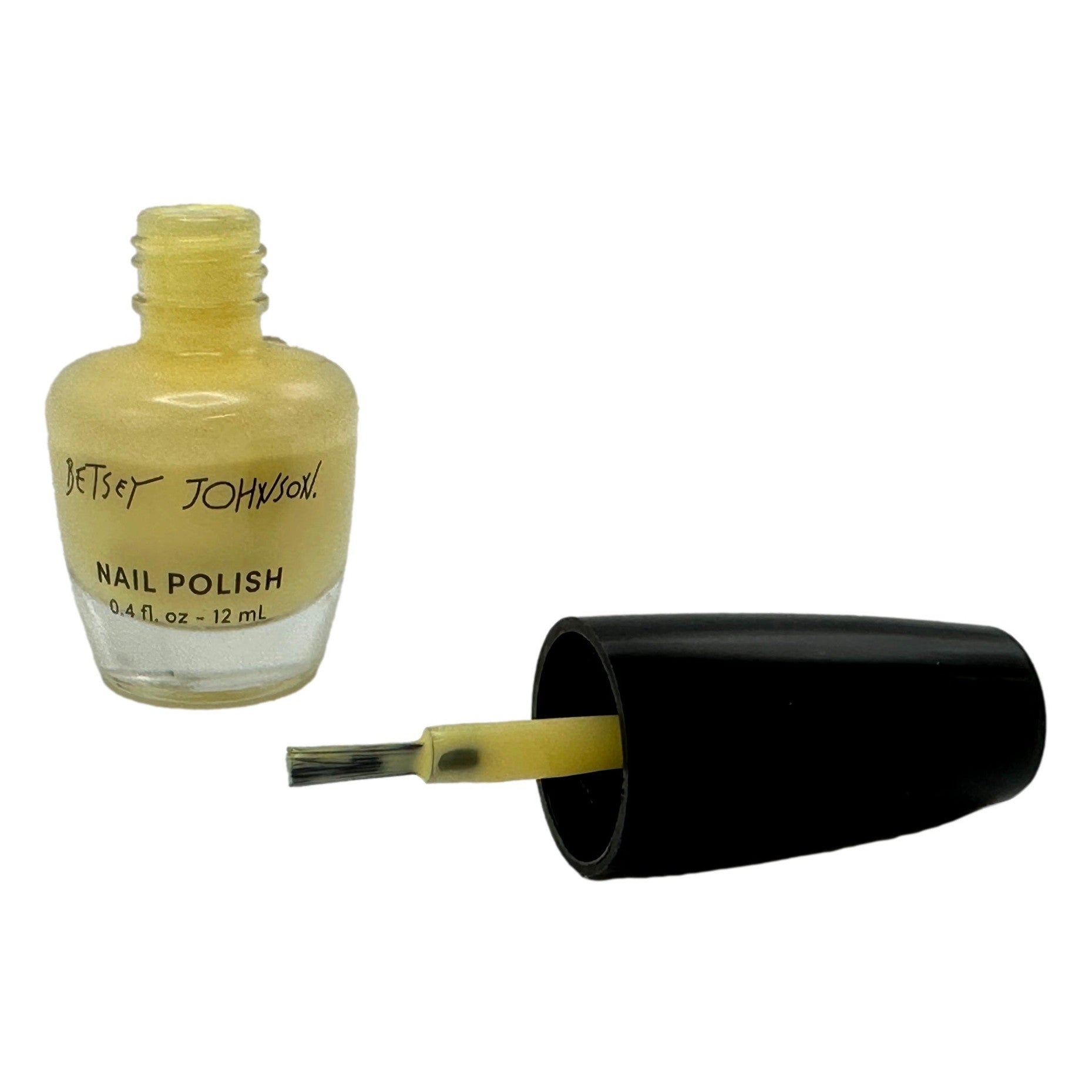 Yellow nail polish bottle with black cap.
