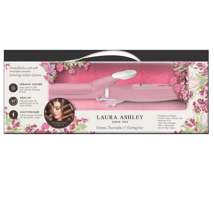 A packaged pink Laura Ashley ceramic curling iron with floral accents.
