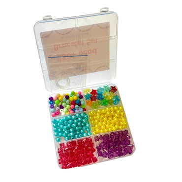 Open clear plastic bead storage box filled with assorted colorful beads.