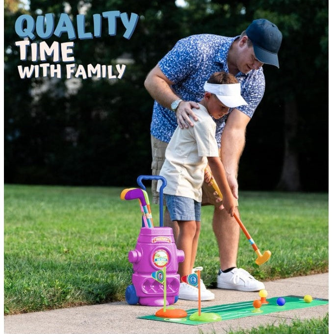 Father helping son play with toy golf set.