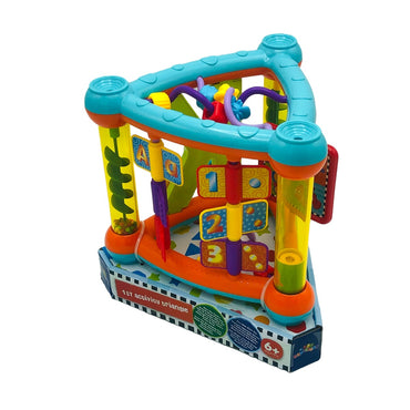 A colorful, triangular activity toy sits atop its packaging.