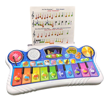 Child's toy keyboard with sheet music stand.