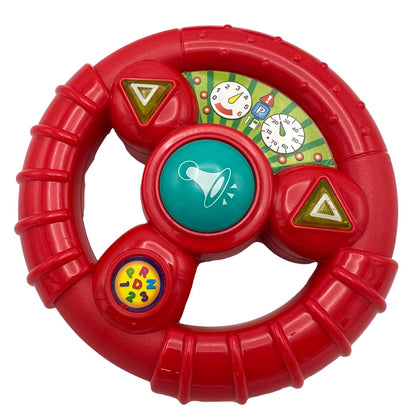 Red plastic toy steering wheel with buttons.