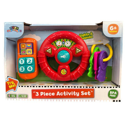 Boxed baby toy set with a red steering wheel, orange phone, and colorful keys.
