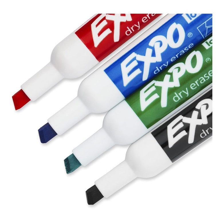 Four dry erase markers in red, blue, green, and black.