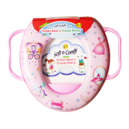 Pink plastic "Soft n Comfy" toilet seat with handles and princess-themed graphics.