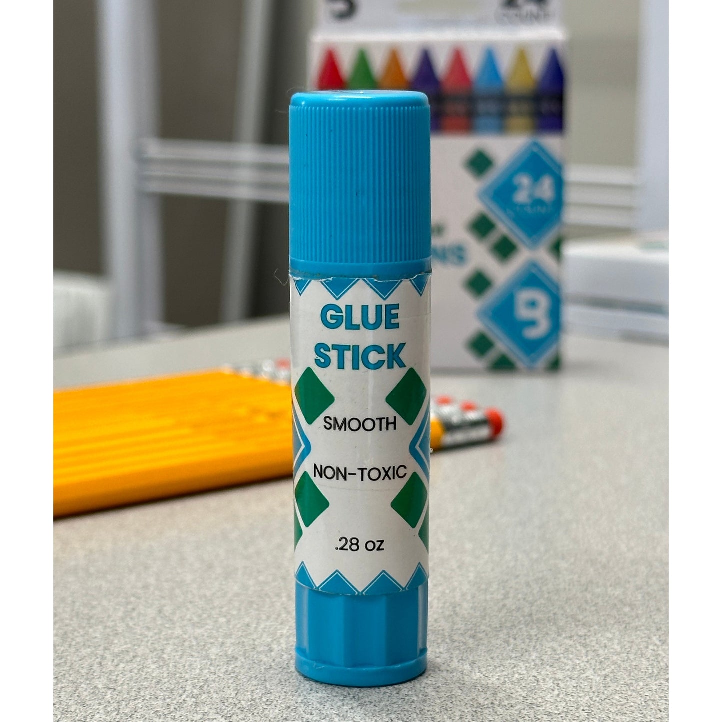 Close-up of a blue glue stick.