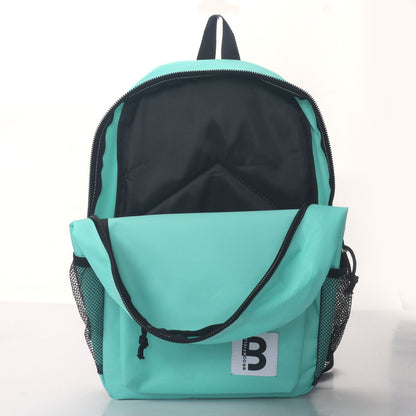 MOCHILA ESCOLAR 15 EN 2 BOLSILLOS LATERALES DE MALLA SURTIDOS