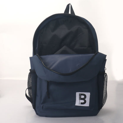 MOCHILA ESCOLAR 15 EN 2 BOLSILLOS LATERALES DE MALLA SURTIDOS