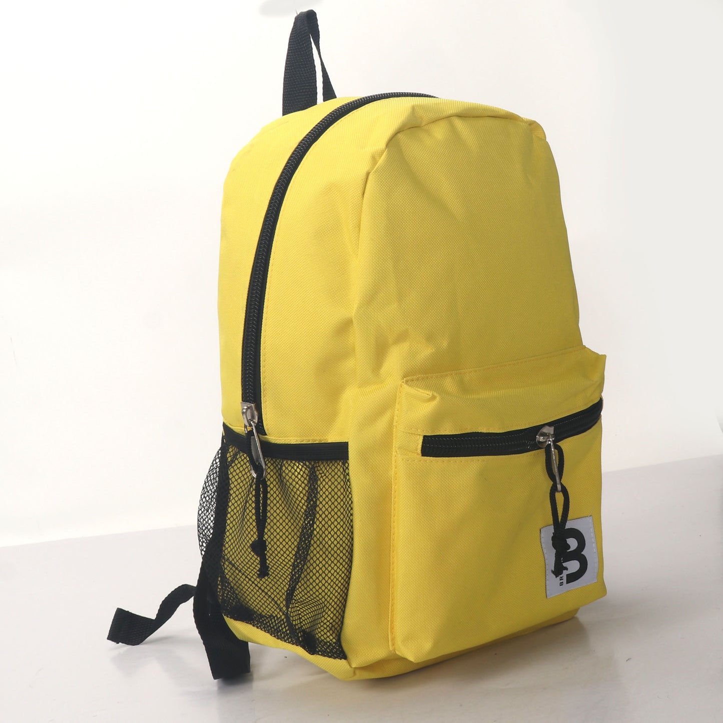 MOCHILA ESCOLAR 15 EN 2 BOLSILLOS LATERALES DE MALLA SURTIDOS