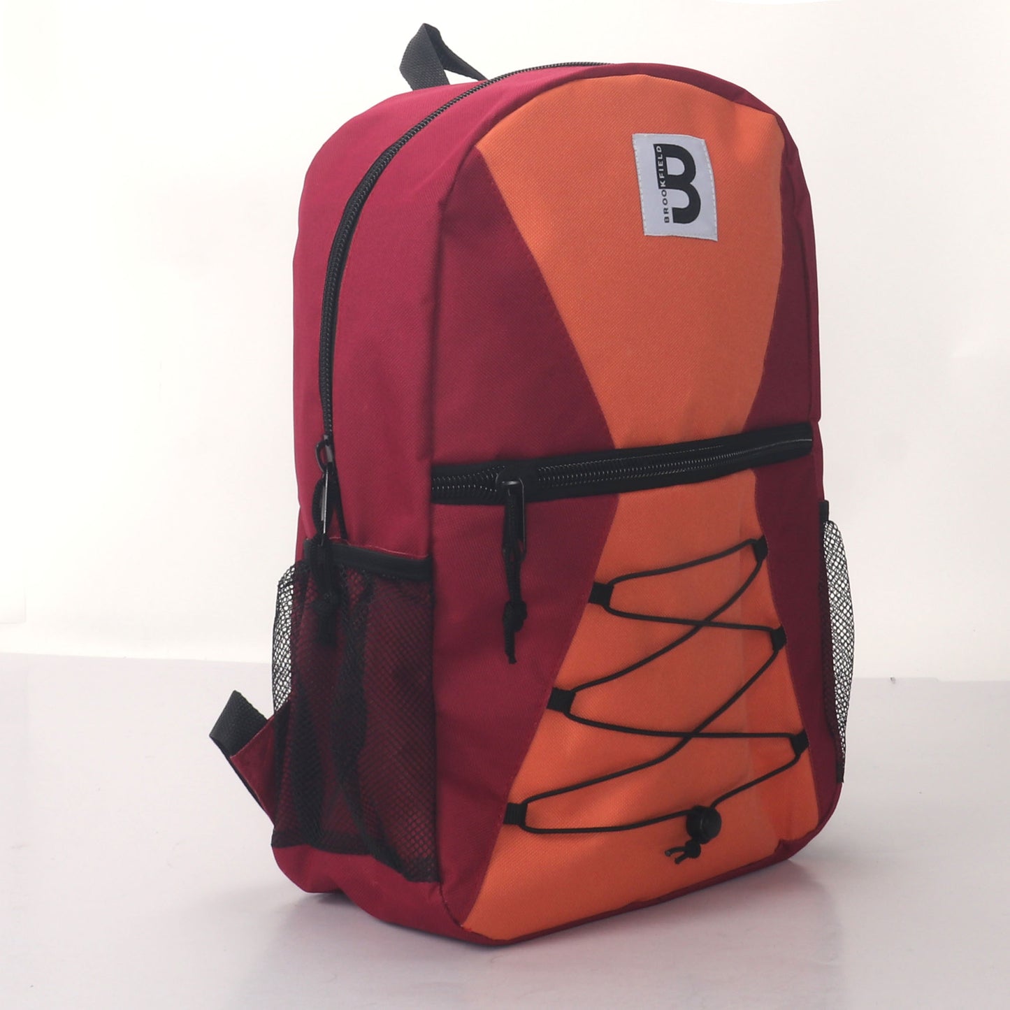 MOCHILA ESCOLAR 17 EN TIENDA CORREA ELÁSTICA DELANTERA CON 2 BOLSILLOS LATERALES DE MALLA VARIADOS