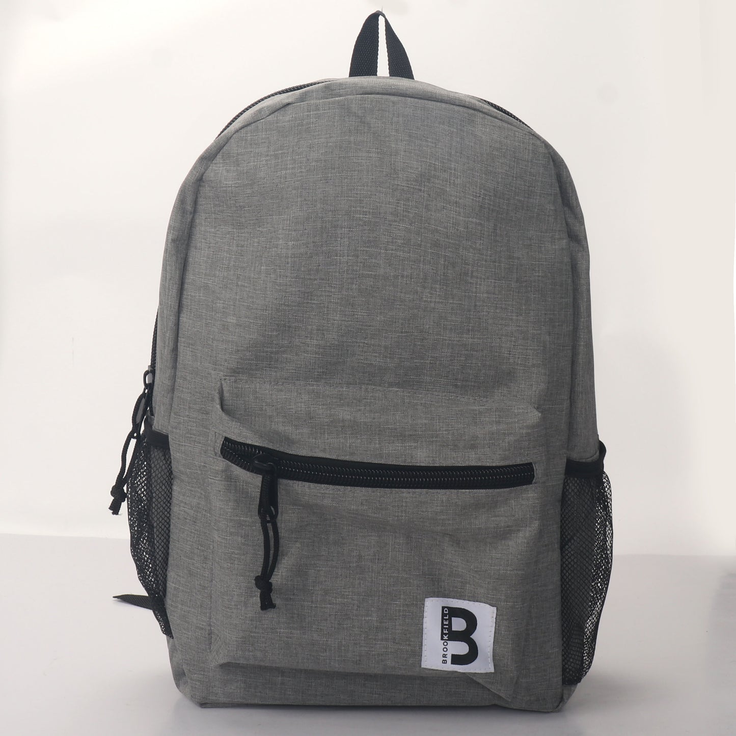 MOCHILA ESCOLAR 19 EN 2 BOLSILLOS LATERALES DE MALLA SURTIDOS