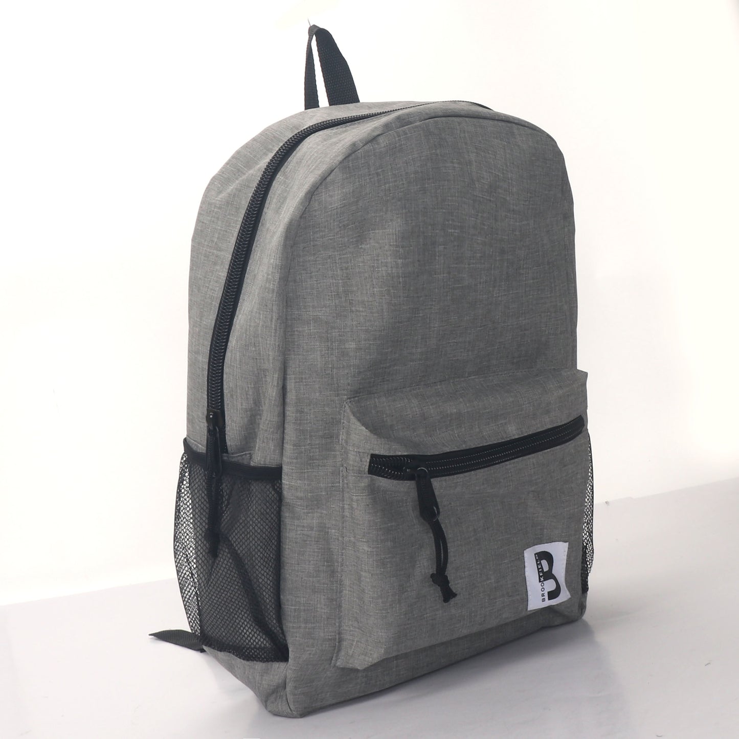 MOCHILA ESCOLAR 19 EN 2 BOLSILLOS LATERALES DE MALLA SURTIDOS