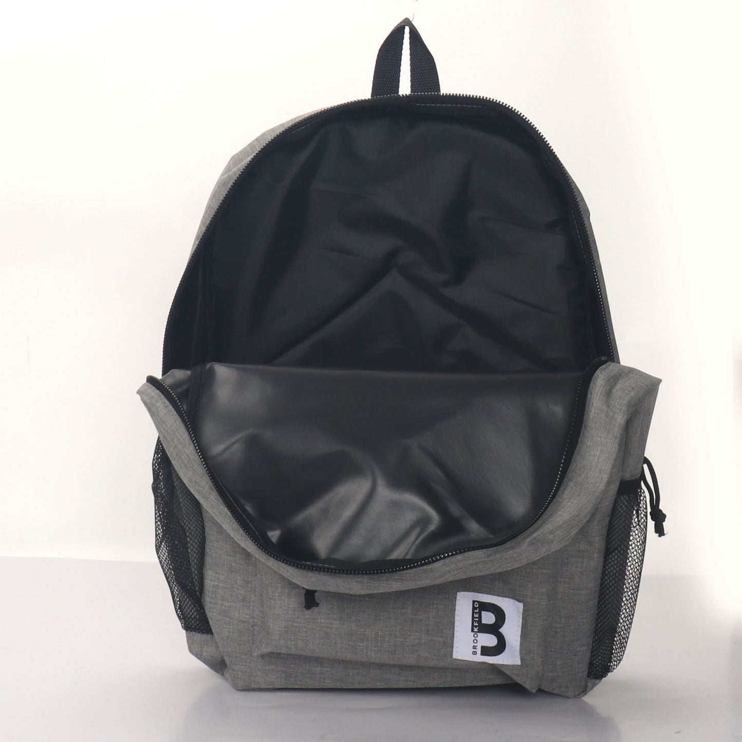 MOCHILA ESCOLAR 19 EN 2 BOLSILLOS LATERALES DE MALLA SURTIDOS