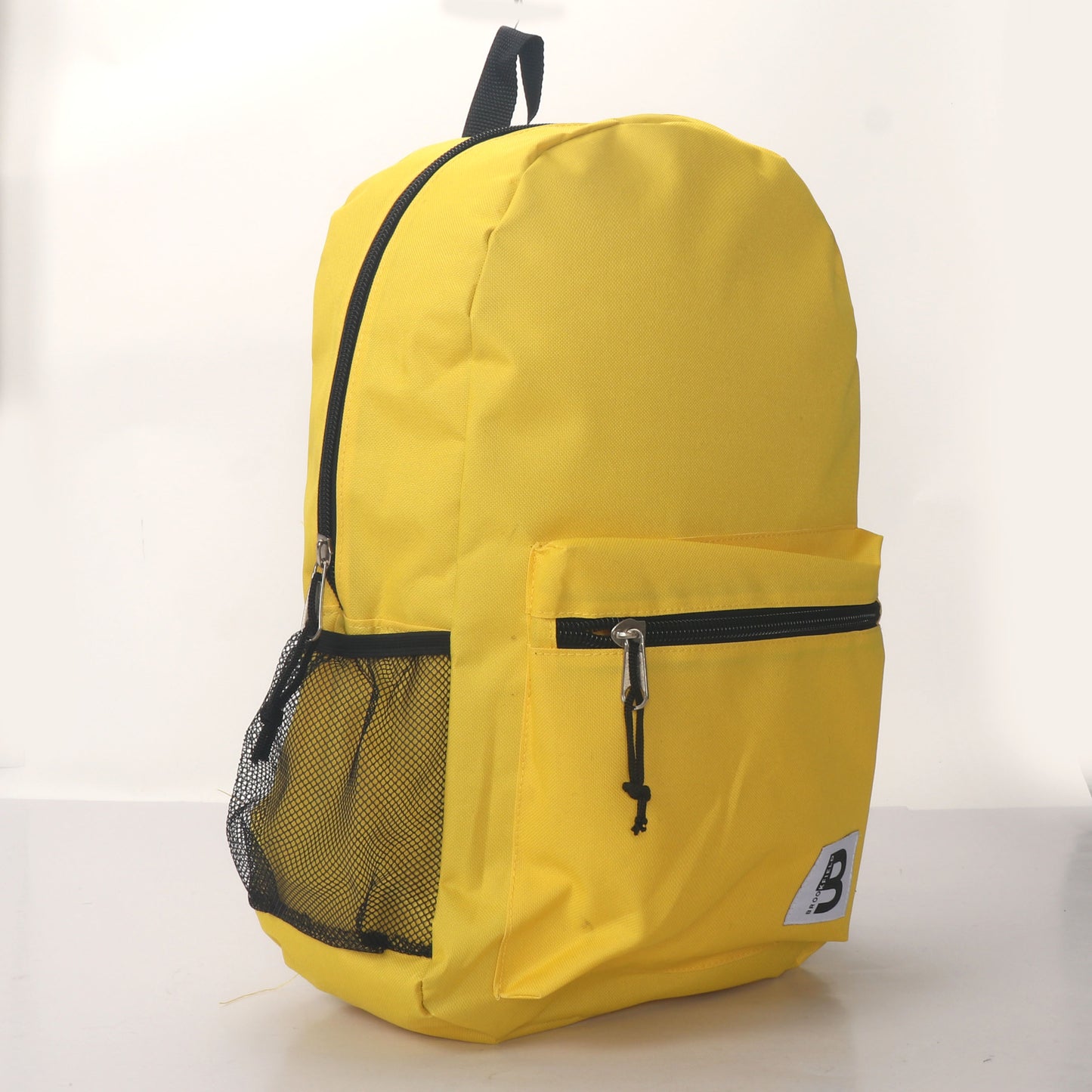 MOCHILA ESCOLAR 19 EN 2 BOLSILLOS LATERALES DE MALLA SURTIDOS