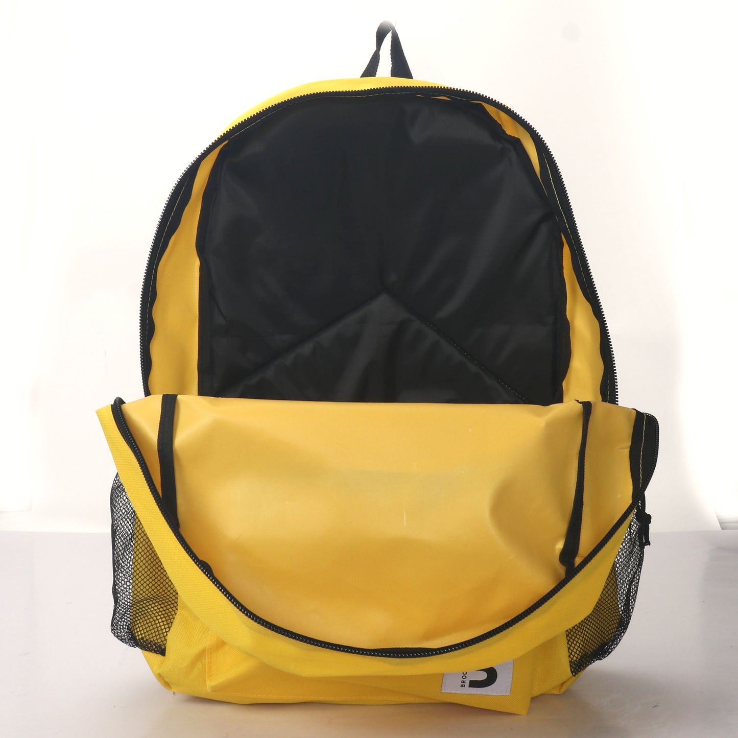 MOCHILA ESCOLAR 19 EN 2 BOLSILLOS LATERALES DE MALLA SURTIDOS