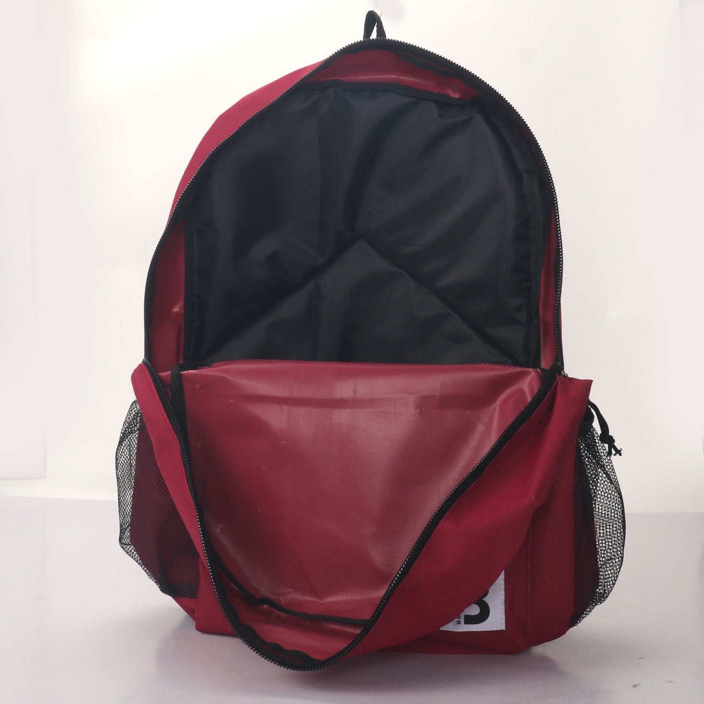 MOCHILA ESCOLAR 19 EN 2 BOLSILLOS LATERALES DE MALLA SURTIDOS