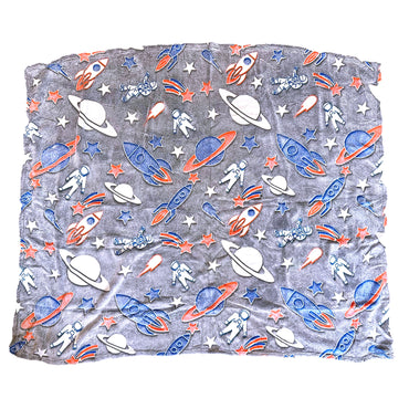 Gray blanket with space-themed print featuring rockets, planets, astronauts, and stars.