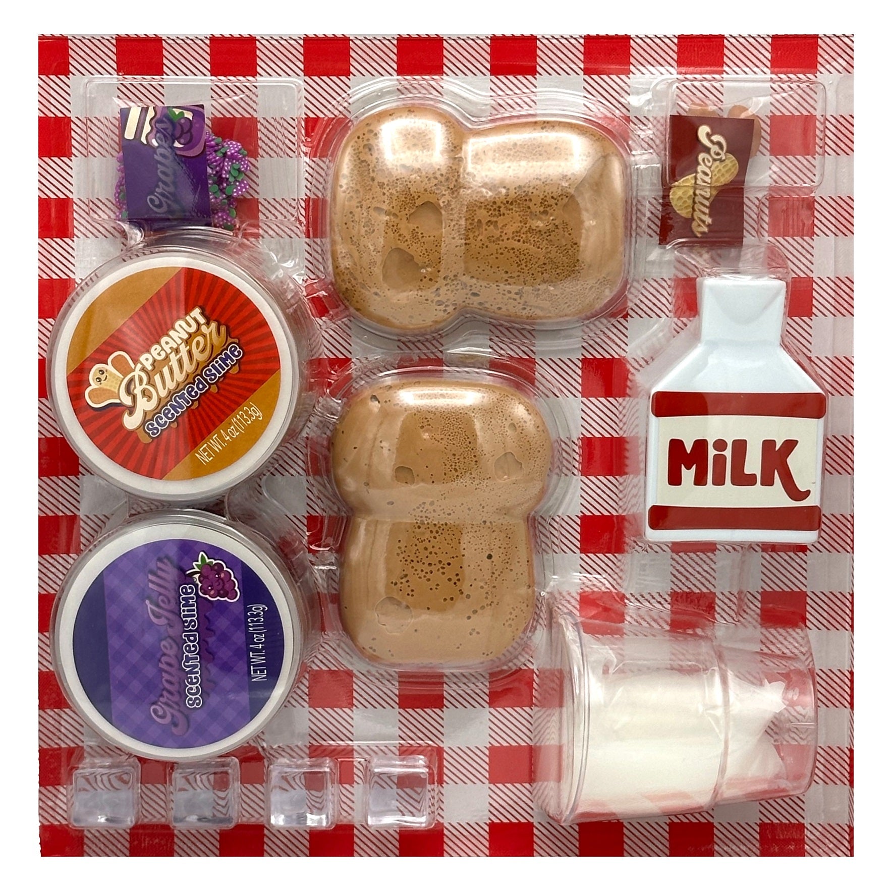 A clear plastic package of pretend food items, with peanut butter and grape jelly slime containers, toy bread, a bag of peanuts, a small carton of milk, and ice cubes, all on a red and white checkered background.