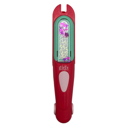 Red and green "Girl's Creator" device with glitter and stars.
