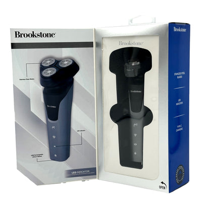 Two Brookstone electric shaver boxes. One is gray and white with an image of the shaver. The second is white and blue, displaying the razor through a transparent window.