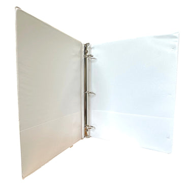 Open white three-ring binder.